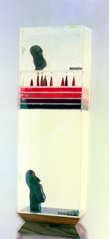 Medium: 'Plastic Boxes, Colour Pigment, Ceramic Heads, Steel Balls, Wooden Stand', Size: '90 x 45 x 20 cm', 'Installation'